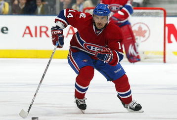 TORONTO, ON - OCTOBER 1:  Tomas Plekanec #14 of the Montreal Canadiens skates with the puck in a game against the Toronto Maple Leafs on October 1, 2009 at the Air Canada Centre in Toronto, Ontario. The Canadiens dfeated the Leafs 4-3 in overtime. (Photo by Claus Andersen/Getty Images)