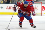 TORONTO, ON - OCTOBER 1:  Tomas Plekanec #14 of the Montreal Canadiens skates with the puck in a game against the Toronto Maple Leafs on October 1, 2009 at the Air Canada Centre in Toronto, Ontario. The Canadiens dfeated the Leafs 4-3 in overtime. (Photo by Claus Andersen/Getty Images)