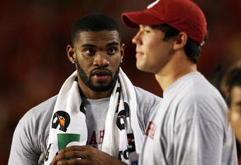 MIAMI GARDENS, FL - OCTOBER 03:  Injured players, tight end Jermaine Gresham #18, L, and quarterback Sam Bradford #14 of the Oklahoma Sooners, talk on the sideline late in the game against the Miami Hurricanes at Land Shark Stadium on October 3, 2009 in Miami Gardens, Florida. Miami defeated Oklahoma 21-20.  (Photo by Doug Benc/Getty Images)
