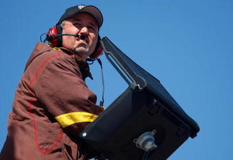 KANSAS CITY, KS - OCTOBER 02: Steve Addington, crew chief for the #18 M7M's Toyota, watches during practice for the NASCAR Sprint Cup Series Price Chopper 400 presented by Kraft Foods at the Kansas Speedway on October 2, 2009 in Kansas City, Kansas.  (Photo by Geoff Burke/Getty Images for NASCAR)