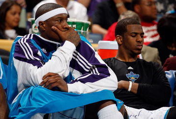 NEW ORLEANS - APRIL 27:   James Posey #41 and Chris Paul #3 of the New Orleans Hornets sit on the bench in the fourth quarter in Game Four of the Western Conference Quarterfinals during the 2009 NBA Playoffs at New Orleans Arena on April 27, 2009 in New Orleans, Louisiana.  The Nuggets defeated the Hornets 121-63.   NOTE TO USER: User expressly acknowledges and agrees that, by downloading and or using this photograph, User is consenting to the terms and conditions of the Getty Images License Agreement.  (Photo by Chris Graythen/Getty Images)