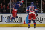 NEW YORK - OCTOBER 26: Enver Lisin #81 of the New York Rangers jumps in celebration of his third period goal as Vaclac Prospal #20 skates towards him in their game against the Phoenix Coyotes at Madison Square Garden on October 26, 2009 in New York City.  The Rangers defeated the Coyotes 5-2. (Photo by Bruce Bennett/Getty Images)