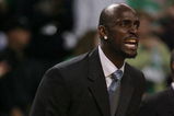 BOSTON - MAY 02:  Kevin Garnett #5 of the Boston Celtics encourages his teammates from the bench in the fourth quarter against the Chicago Bulls in Game Seven of the Eastern Conference Quarterfinals during the 2009 NBA Playoffs at TD Banknorth Garden on May 2, 2009 in Boston, Massachusetts. The Celtics defeated the Bulls 109-99. NOTE TO USER: User expressly acknowledges and agrees that, by downloading and or using this photograph, User is consenting to the terms and conditions of the Getty Images License Agreement.  (Photo by Elsa/Getty Images)
