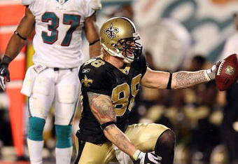 MIAMI - OCTOBER 25:  Tight end Jeremy Shockey #88 of the New Orleans Saints celebrates after making a first down reception over safety Yeremiah Bell #37 of the Miami Dolphins at Land Shark Stadium on October 25, 2009 in Miami, Florida. The Saints defeated the Dolphins 46-34.  (Photo by Doug Benc/Getty Images)