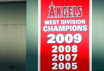 ANAHEIM, CA - OCTOBER 01:  A banner in center field announces the 2009 West Division Champion Los Angeles Angels of Anaheim during the game against the Texas Rangers at Angel Stadium on October 1, 2009 in Anaheim, California. The Rangers defeated the Angels 11-3.  (Photo by Jeff Gross/Getty Images)