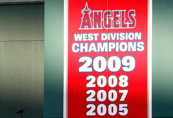 ANAHEIM, CA - OCTOBER 01:  A banner in center field announces the 2009 West Division Champion Los Angeles Angels of Anaheim during the game against the Texas Rangers at Angel Stadium on October 1, 2009 in Anaheim, California. The Rangers defeated the Angels 11-3.  (Photo by Jeff Gross/Getty Images)