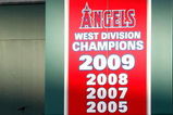 ANAHEIM, CA - OCTOBER 01:  A banner in center field announces the 2009 West Division Champion Los Angeles Angels of Anaheim during the game against the Texas Rangers at Angel Stadium on October 1, 2009 in Anaheim, California. The Rangers defeated the Angels 11-3.  (Photo by Jeff Gross/Getty Images)