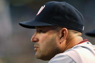 PHOENIX - MAY 08:  Manager Manny Acta #14 of the Washington Nationals looks on from the dugout during the game against the Arizona Diamondbacks at Chase Field on May 8, 2009 in Phoenix, Arizona.  (Photo by Christian Petersen/Getty Images)