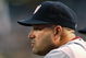 PHOENIX - MAY 08:  Manager Manny Acta #14 of the Washington Nationals looks on from the dugout during the game against the Arizona Diamondbacks at Chase Field on May 8, 2009 in Phoenix, Arizona.  (Photo by Christian Petersen/Getty Images)
