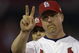 ST. LOUIS - OCTOBER 12:  Mark McGwire #25 of the St.Louis Cardinals salutes the crowd during team introductions before Game three of the National League Division Series against the Arizona Diamondbacks on October 12, 2001 at Busch Stadium in St. Louis, Missouri. The Diamondbacks won 5-3.  (Photo by Elsa/Getty Images)