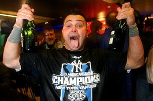 NEW YORK - OCTOBER 25:  Nick Swisher #33 of the New York Yankees celebrates their 5-2 victory over the Los Angeles Angels of Anaheim in Game Six of the ALCS during the 2009 MLB Playoffs at Yankee Stadium on October 25, 2009 in the Bronx borough of New York City. The New York Yankees won the ALCS series 4-2 over the Los Angeles Angels of Anaheim to capture the American League pennant.  (Photo by Al Bello/Getty Images)