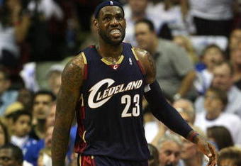 ORLANDO, FL - MAY 30:  LeBron James #23 of the Cleveland Cavaliers looks on between plays against the Orlando Magic in Game Six of the Eastern Conference Finals during the 2009 Playoffs at Amway Arena on May 30, 2009 in Orlando, Florida. NOTE TO USER: User expressly acknowledges and agrees that, by downloading and or using this photograph, User is consenting to the terms and conditions of the Getty Images License Agreement  (Photo by Elsa/Getty Images)