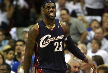 ORLANDO, FL - MAY 30:  LeBron James #23 of the Cleveland Cavaliers looks on between plays against the Orlando Magic in Game Six of the Eastern Conference Finals during the 2009 Playoffs at Amway Arena on May 30, 2009 in Orlando, Florida. NOTE TO USER: User expressly acknowledges and agrees that, by downloading and or using this photograph, User is consenting to the terms and conditions of the Getty Images License Agreement  (Photo by Elsa/Getty Images)
