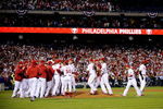 PHILADELPHIA - OCTOBER 21:  The Philadelphia Phillies celebrate defeating the Los Angeles Dodgers 10-4 to advance to the World Series in Game Five of the NLCS during the 2009 MLB Playoffs at Citizens Bank Park on October 21, 2009 in Philadelphia, Pennsylvania.  (Photo by Jeff Zelevansky/Getty Images)