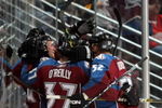 DENVER - OCTOBER 24:  The Colorado Avalanche celebrate a second period goal by TJ Galiardi against the Detroit Red Wings during NHL action at the Pepsi Center on October 24, 2009 in Denver, Colorado.  (Photo by Doug Pensinger/Getty Images)