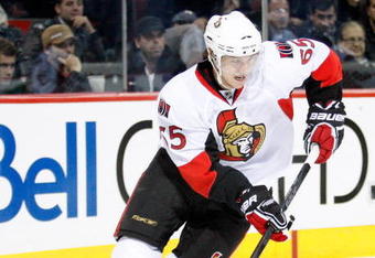 MONTREAL- OCTOBER 17:  Erik Karlsson #65 of the Ottawa Senators skates with the puck during the NHL game against the Montreal Canadiens on October 17, 2009 at the Bell Centre in Montreal, Quebec, Canada.  The Senators defeated the Canadiens 3-1.  (Photo by Richard Wolowicz/Getty Images)