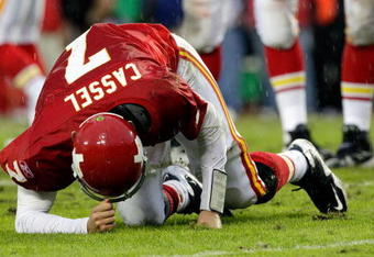 KANSAS CITY, MO - OCTOBER 25:  Quarterback Matt Cassel #7 of the Kansas City Chiefs gets up slowly after being sacked by the San Diego Chargers during the game on October 25, 2009 at Arrowhead Stadium in Kansas City, Missouri.  (Photo by Jamie Squire/Getty Images)