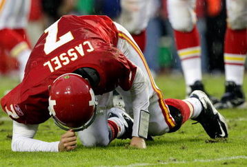 KANSAS CITY, MO - OCTOBER 25:  Quarterback Matt Cassel #7 of the Kansas City Chiefs gets up slowly after being sacked by the San Diego Chargers during the game on October 25, 2009 at Arrowhead Stadium in Kansas City, Missouri.  (Photo by Jamie Squire/Getty Images)