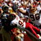 LANDOVER, MD - SEPTEMBER 20:  Mark Bulger #10 of the St. Louis Rams tries to avoid Phillip Daniels #92 and Cornelius Griffin #96 of the Washington Redskins during their game on September 20, 2009 at FedEx Field in Landover, Maryland.  (Photo by Win McNamee/Getty Images)