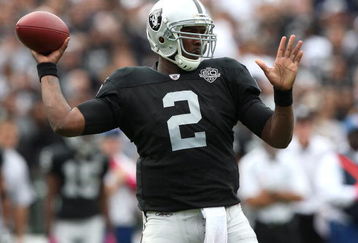 OAKLAND, CA - OCTOBER 18:  JaMarcus Russell #2 of the Oakland Raiders passes against the Philadelphia Eagles during an NFL game at the Oakland-Alameda County Coliseum on October 18, 2009 in Oakland, California.  (Photo by Jed Jacobsohn/Getty Images)