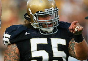 SOUTH BEND, IN - SETPEMBER 19: Eric Olsen #55 of the Notre Dame Fighting Irish points to a referee after a replay showed Notre Dame scored a touchdown against the Michigan State Spartans on September 19, 2009 at Notre Dame Stadium in South Bend, Indiana. Notre Dame defeated Michigan State 33-30. (Photo by Jonathan Daniel/Getty Images)
