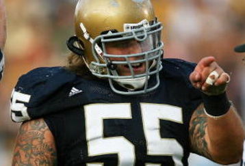 SOUTH BEND, IN - SETPEMBER 19: Eric Olsen #55 of the Notre Dame Fighting Irish points to a referee after a replay showed Notre Dame scored a touchdown against the Michigan State Spartans on September 19, 2009 at Notre Dame Stadium in South Bend, Indiana. Notre Dame defeated Michigan State 33-30. (Photo by Jonathan Daniel/Getty Images)