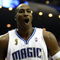 ORLANDO, FL - JUNE 11:  Dwight Howard #12 of the Orlando Magic reatcs in the second quarter of Game Four of the 2009 NBA Finals against the Los Angeles Lakers on June 11, 2009 at Amway Arena in Orlando, Florida.  NOTE TO USER:  User expressly acknowledges and agrees that, by downloading and or using this photograph, User is consenting to the terms and conditions of the Getty Images License Agreement.  (Photo by Elsa/Getty Images)