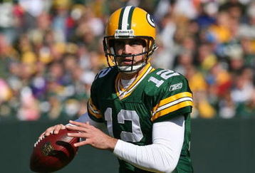 GREEN BAY, WI - OCTOBER 18: Aaron Rodgers #12 of the Green Bay Packers looks for a receiver during a game against the Detroit Lions at Lambeau Field on October 18, 2009 in Green Bay, Wisconsin. The Packers defeated the Lions 26-0. (Photo by Jonathan Daniel/Getty Images)