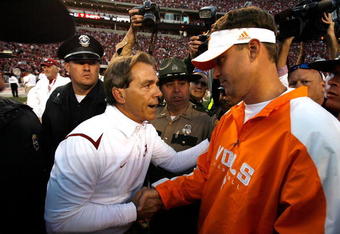 TUSCALOOSA, AL - OCTOBER 24:  Head coach Nick Saban (L) of the Alabama Crimson Tide shakes hands with head coach Lane Kiffin (R) of the Tennessee Volunteers after the Crimson Tide's 12-10 win at Bryant-Denny Stadium on October 24, 2009 in Tuscaloosa, Alabama.  (Photo by Kevin C. Cox/Getty Images)