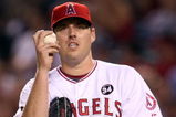 ANAHEIM, CA - OCTOBER 22:  John Lackey #41 of the Los Angeles Angels of Anaheim reacts in Game Five of the ALCS against the New York Yankees during the 2009 MLB Playoffs at Angel Stadium on October 22, 2009 in Anaheim, California.  (Photo by Stephen Dunn/Getty Images)