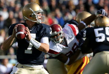 SOUTH BEND, IN - OCTOBER 17: Quarterback Jimmy Clausen #7 of the Notre Dame Fighting Irish looks to pass the ball against the USC Trojans in the first quarter of the game at Notre Dame Stadium on October 17, 2009 in South Bend, Indiana. (Photo by Jonathan Daniel/Getty Images)