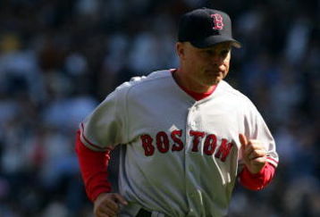BRONX, NY - APRIL 6:  Bench coach Brad Mills #2 of the Boston Red Sox jogs to the dugout during the game against the New York Yankees at Yankee Stadium on April 6, 2005 in Bronx, New York.  The Red Sox won 7-3.  (Photo by Ezra Shaw/Getty Images)