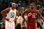 BOSTON - MAY 18:  Paul Pierce #34 of the Boston Celtics and LeBron James #23 of the Cleveland Cavaliers look on in Game Seven of the Eastern Conference Semifinals during the 2008 NBA Playoffs at the TD Banknorth Garden May 18, 2008 in Boston, Massachusetts. Boston won 97-92. NOTE TO USER: User expressly acknowledges and agrees that, by downloading and or using this Photograph, user is consenting to the terms and conditions of the Getty Images License Agreement.  (Photo by Jim Rogash/Getty Images)