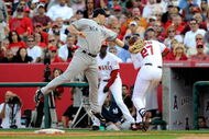 ANAHEIM, CA - OCTOBER 19:  Mark Teixeira #25 of the New York Yankees tags out Vladimir Guerrero #27 of the Los Angeles Angels of Anaheim ending the eigth inning in Game Three of the ALCS during the 2009 MLB Playoffs at Angel Stadium on October 19, 2009 in Anaheim, California.  (Photo by Kevork Djansezian/Getty Images)