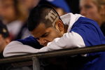 EAST RUTHERFORD, NJ - OCTOBER 25: A New York Giants fan leans over a rail during the game against the Arizona Cardinals on October 25, 2009 at Giants Stadium in East Rutherford, New Jersey. (Photo by Jared Wickerham/Getty Images)