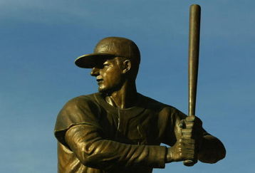 ST. LOUIS - OCTOBER 08:  A statue of Stan Musial from the St. Louis Cardinals sits outside of Bush Stadium before Game Four of the National League Division Series against the San Diego Padres at Busch Stadium on October 8, 2006 in St. Louis,  Missouri.  (Photo by Christian Petersen/Getty Images)