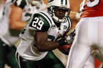 MIAMI - OCTOBER 12:  Running back Leon Washington #29 of the New York Jets is chased down by linebacker Jason Taylor #99 of the Miami Dolphins at Land Shark Stadium on October 12, 2009 in Miami, Florida. The Dolphins defeated the Jets 31-27.  (Photo by Doug Benc/Getty Images)