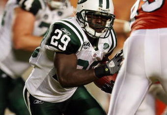 MIAMI - OCTOBER 12:  Running back Leon Washington #29 of the New York Jets is chased down by linebacker Jason Taylor #99 of the Miami Dolphins at Land Shark Stadium on October 12, 2009 in Miami, Florida. The Dolphins defeated the Jets 31-27.  (Photo by Doug Benc/Getty Images)