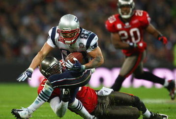 LONDON, ENGLAND - OCTOBER 25:  Wes Welker (#83) of the New England Patriots is tackled during the NFL International Series match between New England Patriots and Tampa Bay Buccaneers at Wembley Stadium on October 25, 2009 in London, England. This is the third occasion where a regular season NFL match has been played in London.  (Photo by Julian Finney/Getty Images)