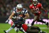 LONDON, ENGLAND - OCTOBER 25:  Wes Welker (#83) of the New England Patriots is tackled during the NFL International Series match between New England Patriots and Tampa Bay Buccaneers at Wembley Stadium on October 25, 2009 in London, England. This is the third occasion where a regular season NFL match has been played in London.  (Photo by Julian Finney/Getty Images)