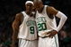 BOSTON - MAY 17:  Rajon Rondo #9 and Ray Allen #20 of the Boston Celtics talk as the Orlando Magic shoot a free throw in Game Seven of the Eastern Conference Semifinals during the 2009 NBA Playoffs at TD Banknorth Garden on May 17, 2009 in Boston, Massachusetts. The Orlando Magic defeated the Boston Celtics 101-82 to advance to the Eastern Conference Finals. NOTE TO USER: User expressly acknowledges and agrees that, by downloading and or using this photograph, User is consenting to the terms and conditions of the Getty Images License Agreement.  (Photo by Elsa/Getty Images)