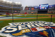 NEW YORK - OCTOBER 27: Members of the Philadelphia Phillies warm up during World Series workouts on October 27, 2009 at Yankee Stadium in the Bronx borough of New York City. (Photo by Jared Wickerham/Getty Images)
