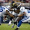 ST. LOUIS, MO - OCTOBER 25: Randy McMichael #84 of the St. Louis Rams is tackled by Kelvin Hayden #26 and Antoine Bethea #41 of the Indianapolis Colts at the Edward Jones Dome on October 25, 2009 in St. Louis, Missouri.  (Photo by Dilip Vishwanat/Getty Images)