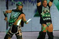 LAS VEGAS - AUGUST 24:  Wrestlers and tag team partners Shawn Michaels (L) and Triple H are introduced during the WWE Monday Night Raw show at the Thomas & Mack Center August 24, 2009 in Las Vegas, Nevada.  (Photo by Ethan Miller/Getty Images)