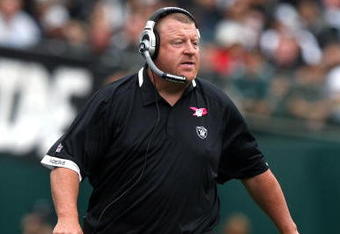 OAKLAND, CA - OCTOBER 18: Head coach Tom Cable of the Oakland Raiders looks on against the Philadelphia Eagles during an NFL game at the Oakland-Alameda County Coliseum on October 18, 2009 in Oakland, California.  (Photo by Jed Jacobsohn/Getty Images)