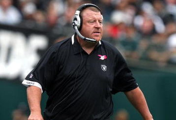 OAKLAND, CA - OCTOBER 18: Head coach Tom Cable of the Oakland Raiders looks on against the Philadelphia Eagles during an NFL game at the Oakland-Alameda County Coliseum on October 18, 2009 in Oakland, California.  (Photo by Jed Jacobsohn/Getty Images)