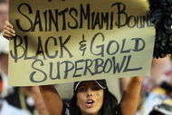 MIAMI - OCTOBER 25:  A Saints' fan shows her support as the New Orleans Saints take on the Miami Dolphins at Land Shark Stadium on October 25, 2009 in Miami, Florida. The Saints defeated the Dolphins 46-34.  (Photo by Doug Benc/Getty Images)