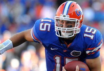 GAINESVILLE, FL - OCTOBER 17: Quarterback Tim Tebow #15 of the Florida Gators rushes upfield against the University of Arkansas Razorbacks October 17, 2009 at Ben Hill Griffin Stadium in Gainesville, Florida.  (Photo by Al Messerschmidt/Getty Images)