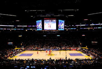 LOS ANGELES, CA - OCTOBER 27:  The Los Angeles Clippers and the Los Angeles Lakers tip off to start the season opening game at Staples Center on October 27, 2009 in Los Angeles, California.  NOTE TO USER: User expressly acknowledges and agrees that, by downloading and or using this photograph, User is consenting to the terms and conditions of the Getty Images License Agreement. Mandatory Copyright Notice: Copyright 2009 NBAE  (Photo by Maxx Wolfson/Getty Images)