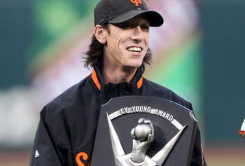 SAN FRANCISCO - APRIL 08:  Pitcher Tim Lincecum #55 of the San Francisco Giants celebrates after receiving his 2008 Cy Young award before his game against the Milwaukee Brewers at a Major League Baseball game on April 8, 2009 at AT&T Park in San Francisco, California.  (Photo by Jed Jacobsohn/Getty Images)